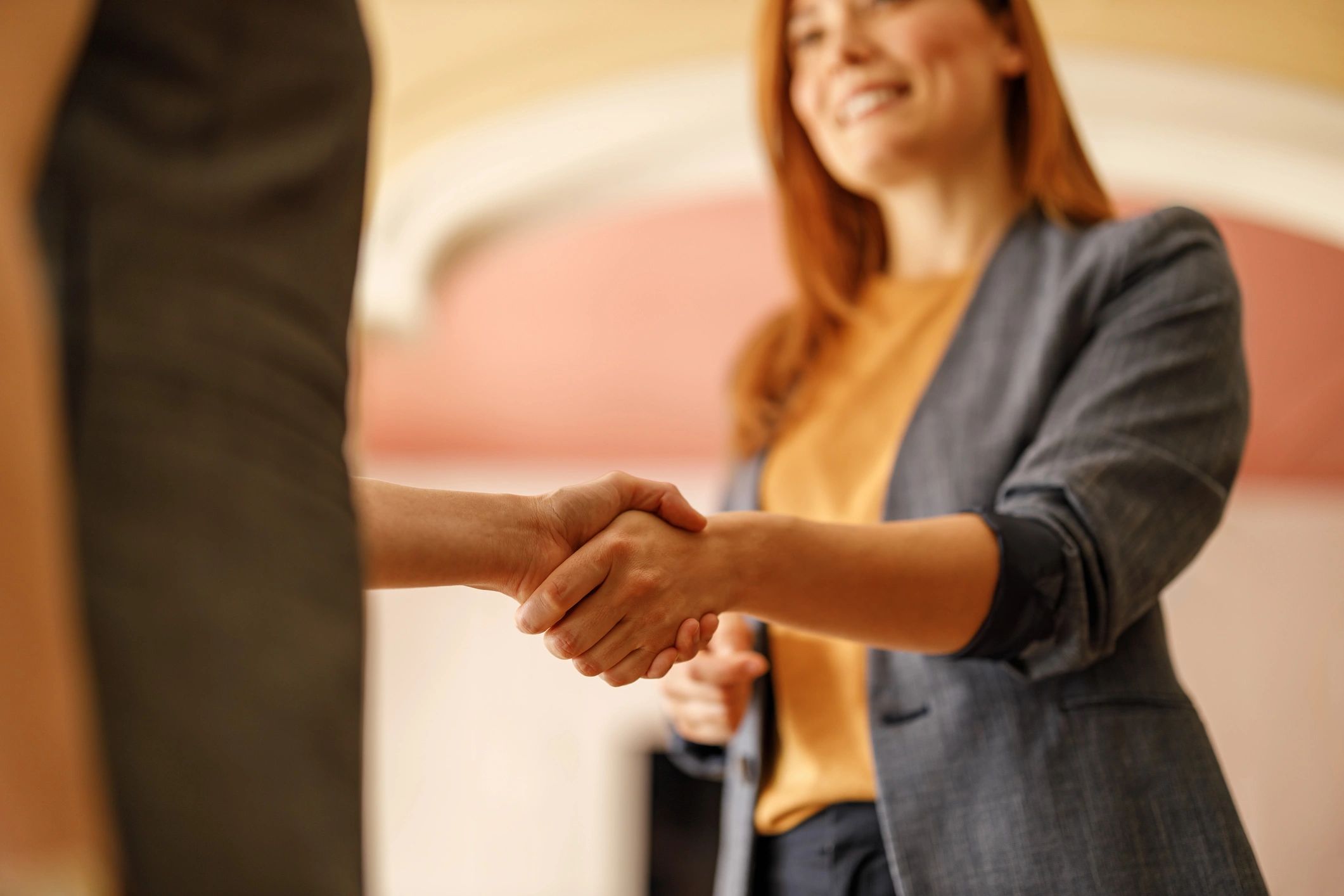 Handshake representing employment support and a new job offer